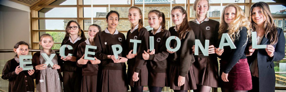 Students holding exceptional letters