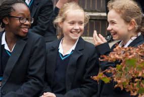 School girls laughing